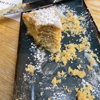 Lemon cake. Nice to see a vegan dessert that doesn’t seem like just an afterthought but it was cold and dry in the middle which is v disappointing for a $9 slice of cake    at Whiskey Kitchen in Raleigh