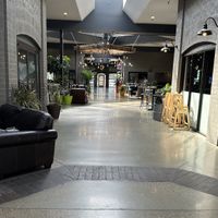 Outdoor space with lots of seating and tables, great for studying   at Button Rock Bakery & Kenny Lou's Deli in Lafayette