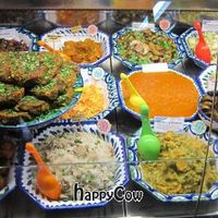 The daily menu inside the deli case at El Piano - Malaga in Malaga