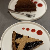 Chocolate cake with apricot jam & a traditional Italian cake with blackberry topping   at Pizzeria Daniela in Montebelluna
