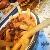 Loaded fries, Notorious VFC2.0 burger and Harlem Fake burger at the back  at Fat Hippo in Nottingham