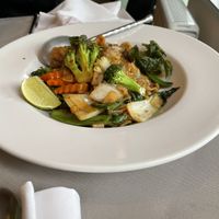 Spicy flat rice noodle dish, veganised by asking for no egg and tofu instead of meat (they were happy to do that)  at Nuntee in South West London