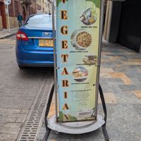 Sidewalk sign at Govindas Las Nieves in Bogota
