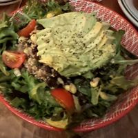 Vegan quinoa black bean and corn salad with a ripe avocado. Yum!  at The Weary Traveler in Madison