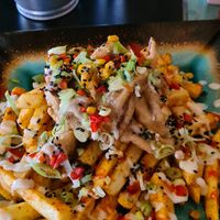 Kalamari with loaded fries at Jungle Bird in Birmingham
