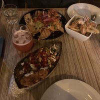 Shrimp loaded fries , nachos and fritters   at Jungle Bird in Birmingham