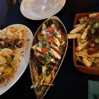 caulk tacos, fritters and loaded fries  at Jungle Bird in Birmingham