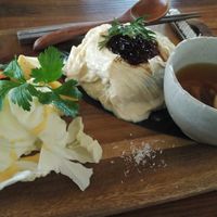 The yuba set. This is a very unique dish. Strips of yuba were laid over a heap of rice. Yuba doesn't have much taste, other than a very light soya flavour, but it goes very well with the sauce served on top of it. at Yasai Cafe Meguri in Nikko