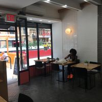 Inside seating at Pure Grit BBQ in New York City