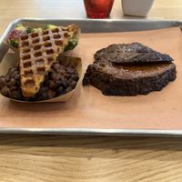 Impossible cut brisket and some sides  at Pure Grit BBQ in New York City