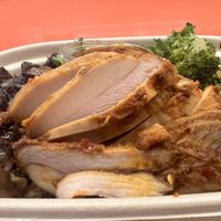 BBQ “chicken” with generous and delicious sides  at Pure Grit BBQ in New York City