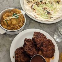 Garlic naan, aloo gobi and vegetable fritters at Chaakoo - City Centre in Glasgow