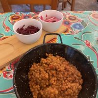 Cazuelitas with lentils and garnishes  at Taquería Las Calacas in Gijon