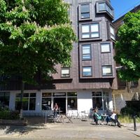 Exterior and outdoor seating at The Classroom N7 in North London