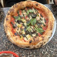 pizza with eggplant and pesto  at Al Catzone Pizza Napovegana in Berlin