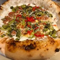 Pizza with broccoli rabe and sausage at Al Catzone Pizza Napovegana in Berlin