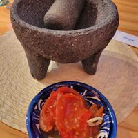 You'll make dishes using a traditional molcajete at Aura Cocina Mexicana in Mexico City