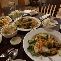 Mixed vegetables dish, drunken noodles and red curry.   at Kao Thai Restaurant in Silver Spring