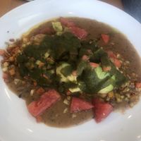 Biscuit with avocado, cilantro, and gravy  at Full Taste in Chamblee