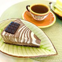 Raw vegan "Three Chocolates" cake and date decaf coffee. at SweetLi by Lilit in Yerevan