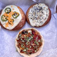 Jalapeño cheddar bagel bomb, everything bagel bomb, and ratatouille tart    at Organicos Bakery in Phoenix