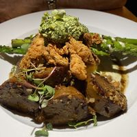 Sausage, polenta, cashew sauce dish.   at Ipanema in Richmond