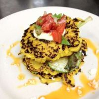 Cachapas (sweet corncakes) with salsa and grilled zucchini at Ipanema in Richmond