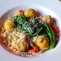 Pumpkin dumplings with broccoli rabe and white bean stew. at Ipanema in Richmond