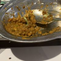 Fast aufgegessen, war zu lecker 🤤  Pürierte Aubergine mit Erbsen und kräftiger Soße  at Khana Khazana in Lindau