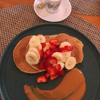 Vegan Oat Pancake with fruits 🍌  at Cantina do Bem in Caminha