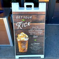 Sandwich board outside at Wild Pony Coffee Co in Evansville