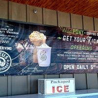 Banner outside at Wild Pony Coffee Co in Evansville