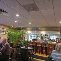 view of bar from the front seating area at Young's Café Vietnamese Cuisine in Fort Collins