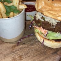 Falafel burger with fries and extra vegan cheese  at Simply Social in Ubud