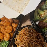 Mock sesame chicken with white rice, mock beef and broccoli, and mock chicken lo mein at China Panda in Richmond