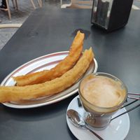Big churros and coffee at Café Niza in Cordoba