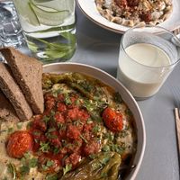 Oven baked Aubergine & traditional ravioli with the BEST (cashew) Ayran.  at Vegan Dükkan Lokanta - The Eatery in Istanbul