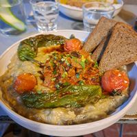 Smoked eggplant (curry at the background) at Vegan Dükkan Lokanta - The Eatery in Istanbul