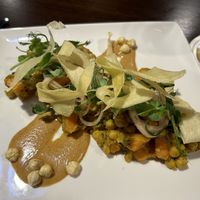 Sweet potato & chickpeas with hazelnuts & parsnip crisps.   at Bartley's in Dublin