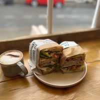 Cappuccino. L- Tomato, mozzarella (vg) and basil sandwich. R- BLT  at The Tinker's Granddaughter in Lymington