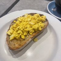 This is how it’s served, the scramble doesn’t even cover surface of the bread 🙈  at Bluebelles of Portobello in West London