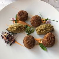 I think they were lentil amaranth meatballs with eggplant cream (the sort of paste) at Hotel Ristorante Cesare in San Marino City