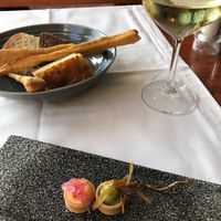 Bread selection and very flavoursome hors d'oeuvres, with local San Marino white wine (mineral filtration). at Hotel Ristorante Cesare in San Marino City