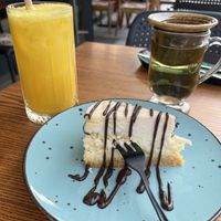Pineapple Cheesecake, Fresh Orange Juice, Mint Teaa  at Pink in Warsaw