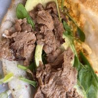 soy chunks added to scrambled eggs inside Fried rice pancakees  at Pink in Warsaw