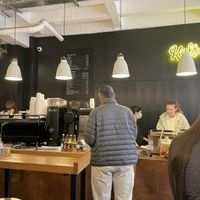 View of the bar from my seat at the back  at Kaffeine - Eastcastle St in London