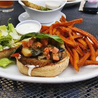 Sausage burger and sweet potato fries. at Native Foods in Tigard