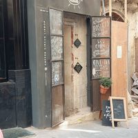 Entrance, top left door shows vegan options at Coffee Circus - Lisboa in Valletta