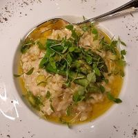 Smoked onion and asparagus risotto with grated lemon rind at Cultivate Cafe in Central Singapore