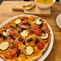 Vegan pizza and carrot soup   at Råvarene - Café & Bio Bistro in Bergen